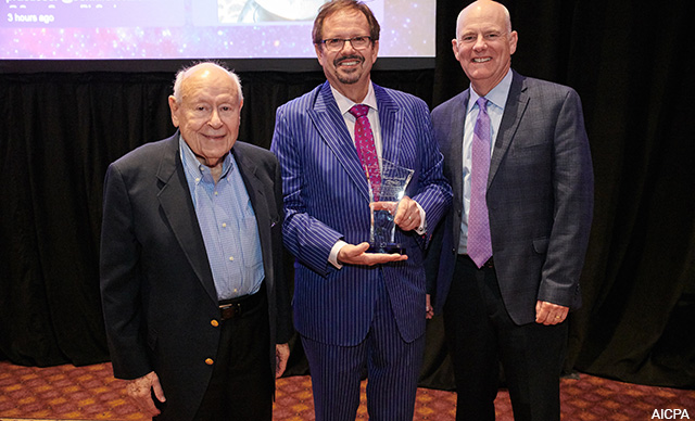 Sidney Kess, left, pictured with Theodore J. Sarenski, middle, and Marty Finn in 2018. Sarenski was awarded the AICPA’s Sidney Kess Award for Excellence in Continuing Education at the Tax Strategies for High Income Individuals conference, which Finn chaired that year.